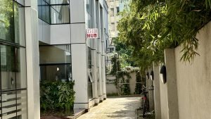 Photo of the Alley with the Lunch Hub sign towards the end