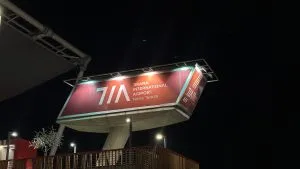TIA Airport Sign from outside, at night.