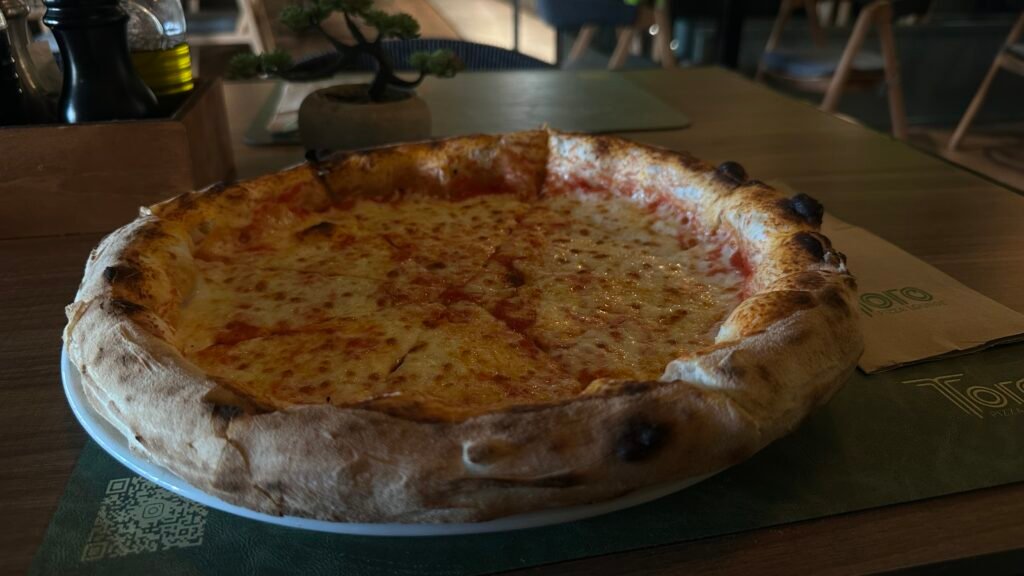 Toro Pizza Photo. Note the incredible Crust.