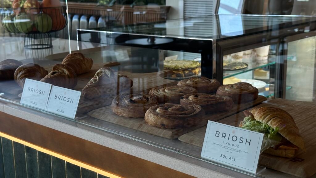 Case of pastries and grab-and-go baked goods.